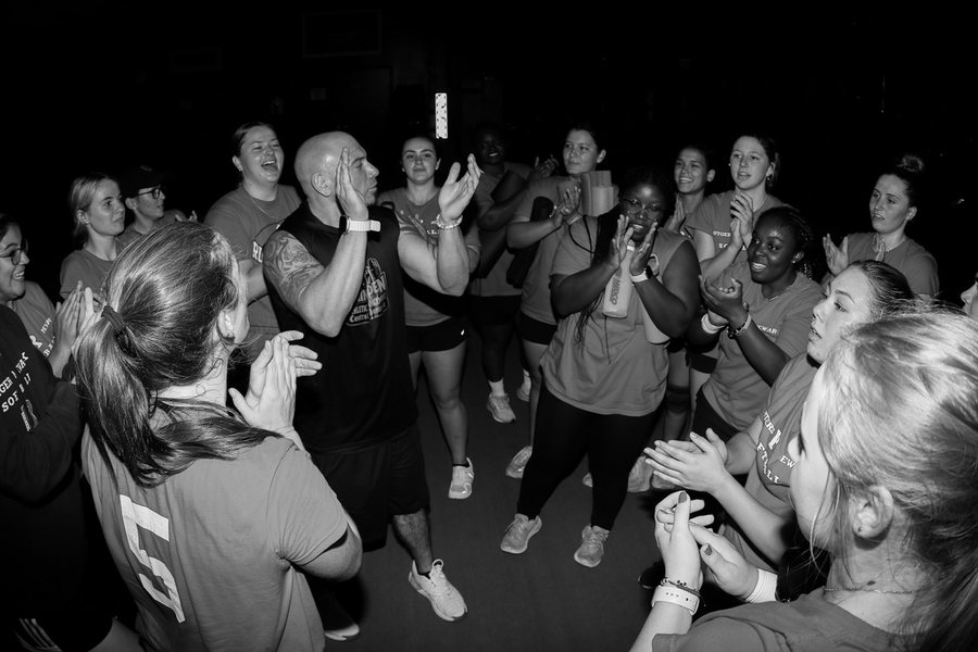 Rhino Den athletes celebrating together after a training session