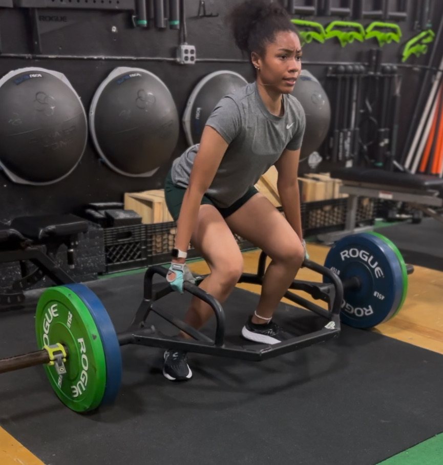 Athlete pulling a loaded trap bar at Rhino Den